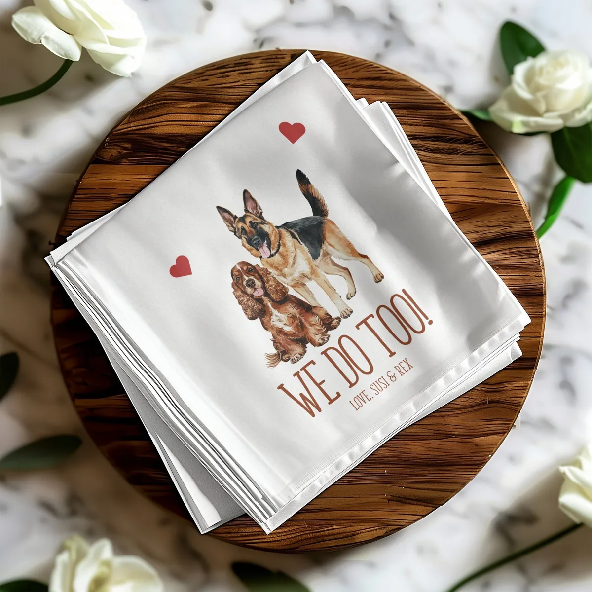 Dog and cat portrait napkin reading We do too